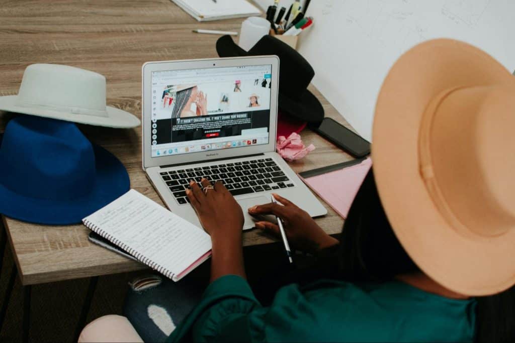 A woman creating a blog post